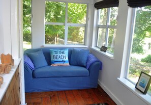 Bunk bed area with couch and tv