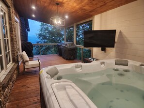 6-7 person Hot Tub, Grills, TV and Sonos speaker on side main floor deck.