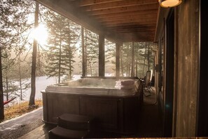 Unwind in the soothing waters of a private hot tub