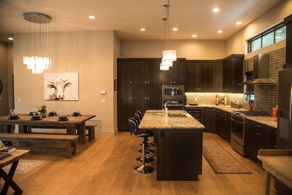 Open concept modern kitchen and dining room