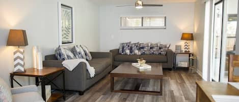 Kick off your flip-flops after a day at the beach in a bright & comfy living room; complete with 50 inch TV & 2 plush couches perfect for a nap!  Totally renovated unit.
Video walk through: https://video214.com/play/wcOI1WcInfOvbNgF2hCV0A/s/dark