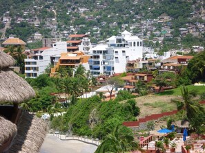 View of the Bahia Suites building from the beach.
