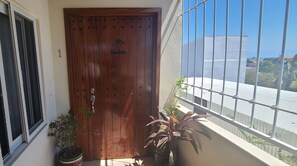 Montana Suite's hand-crafted wood entrance door.