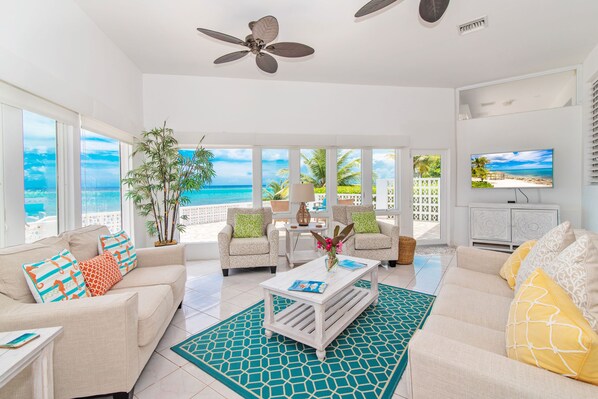 You will love the spacious living room with a wide view of the ocean.