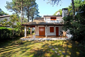 External view of the building. Patio and garden