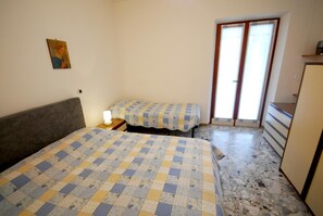 room with double bed and single bed