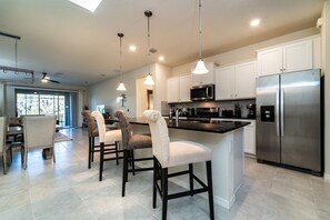 Kitchen and breakfast bar