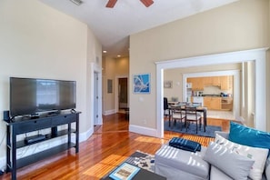 Your apartment has been recently updated with refinished hardwood floors and local art