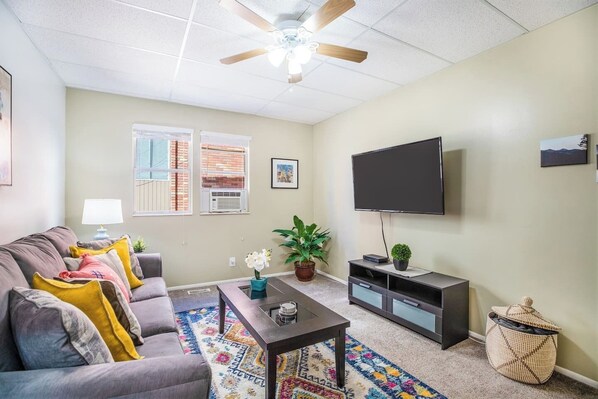 Relax and unwind in a cozy living room with a comfortable couch
