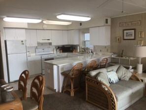 A well stocked open kitchen area.