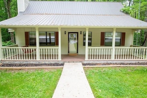 Covered front porch, a guest favorite.