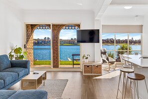 Open plan living, dining & kitchen with fabulous water views