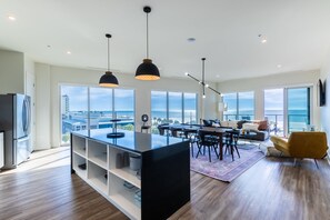 Spacious kitchen equipped with modern appliances and cooking basics to make you favorite meals!