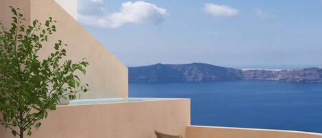 Amazing view to the caldera cliffs and the sea