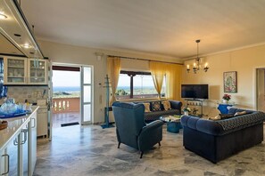 Cozy & Stylish Living Room
Comfortable interior with natural light and garden access