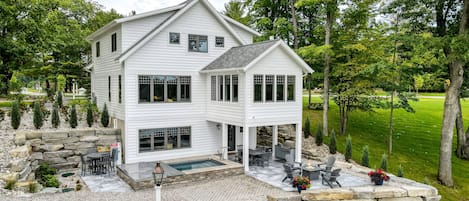 Lakeside of the house. Private Hot Tub, Outdoor Shower, Gas Grill and Fire pit.