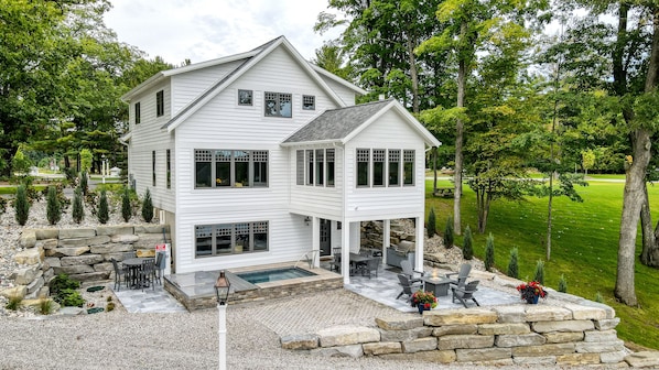 Lakeside of the house. Private Hot Tub, Outdoor Shower, Gas Grill and Fire pit.