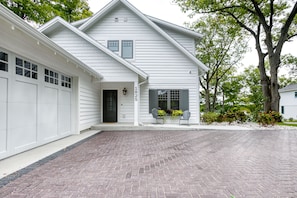 Front Side of the house, single car garage for compact cars.