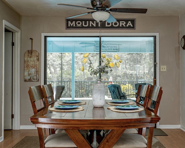 Dining table with ext. leaf. (Located in master closet). Extra chairs in garage.