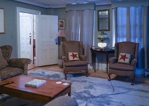 Relax in the serene ambiance of our plush living area.