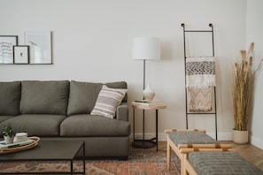 cozy living room w/ ample seating & smart TV