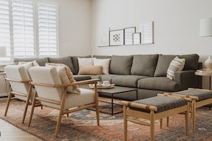 cozy living room w/ ample seating & smart TV