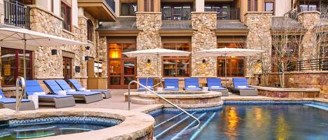 Heated outdoor pool with two hot tubs