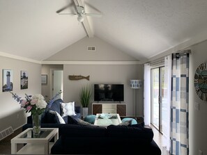 Living room with pool access