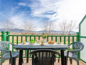 Table, Cloud, Sky, Furniture, Tableware, Green, Chair, Outdoor Table, Nature, Wood