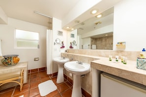 Double Sink and Make Up Area Allow Couples the Space to get Ready at leisure.