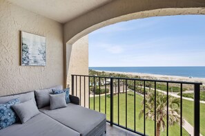 Private Covered Balcony off of the Master Featuring Chaise Lounges and Breathtaking Ocean Views