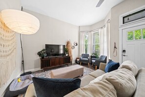 Large living area with a pullout sofa.