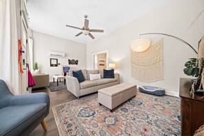 Large living area with a pullout sofa.