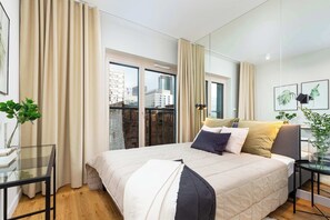 The cosy bedroom features a luxurious double bed.