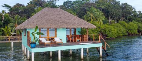 Overwater Bungalow "Piña" is located on the corner with amazing views.