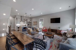 Second floor living is open to the kitchen