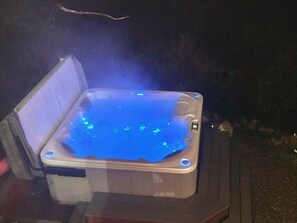 5 seater hot tub with colorful LED lights.