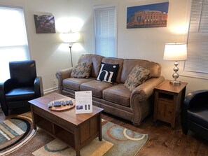 Nicely Furnished Living Room with sleeper sofa. Let the memory begin!