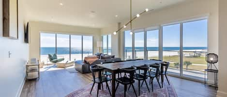 Open floor plan from the kitchen to the living room with floor to ceiling glass windows!