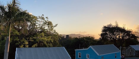 Mountainside is the Caribbean blue cottage to the left. 