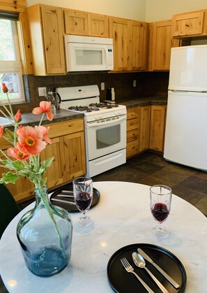 Fully stocked kitchen - dine in with tree house views!