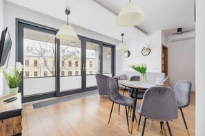 The living room's modern and stylish decor creates a welcoming and atmosphere. 