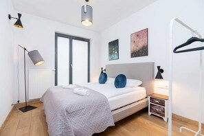 The bedroom features a luxurious double bed for a restful night's sleep. 
