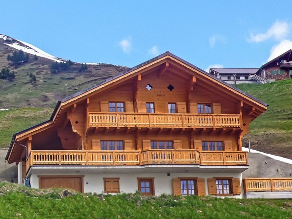 Sky, Building, Property, Window, Plant, Cloud, Mountain, House, Wood, Landscape
