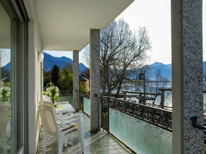 Sky, Building, Plant, Porch, Shade, Wood, Interior Design, Floor, Tree, Condominium