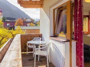 Building, Table, Property, Window, Wood, Flowerpot, Orange, Architecture, Plant, Porch