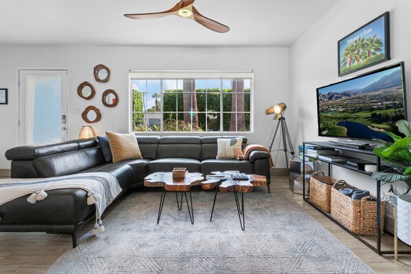 Relaxing living room space. Front door entrance.