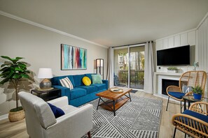 The living area has been beautifully refurbished with 3 chairs and a queen sofa bed.