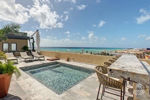The roofdeck lounge & pool area has a stellar ocean view!