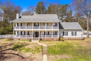 Our large front yard was made for yard games & letting your youngest crew members run around!